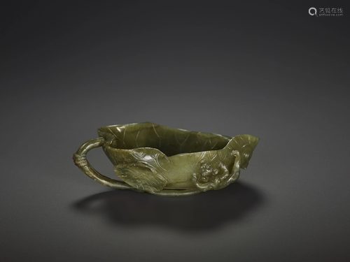 A SPINACH JADE 'LOTUS' WASHER, QING