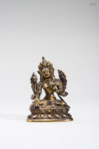 A SINO-TIBETAN GILT MINIATURE BRONZE SITATARA…