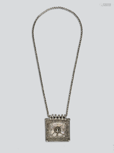 A GAU BOX SILVER PENDANT, 19th CENTURY