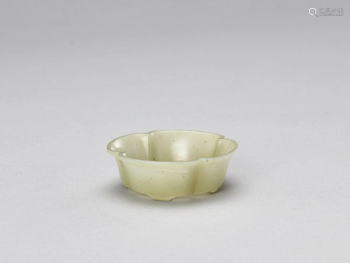 A QUATREFOIL CELADON JADE BOWL, QING