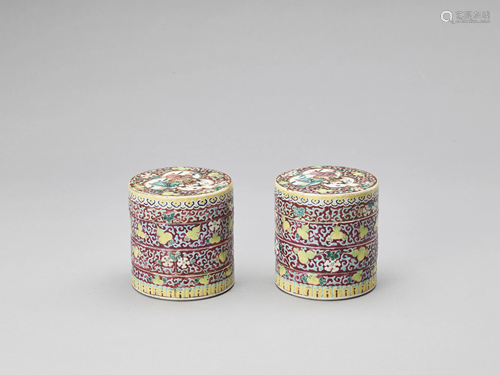 A PAIR OF THREE-TIERED PORCELAIN COSMETIC BOXES