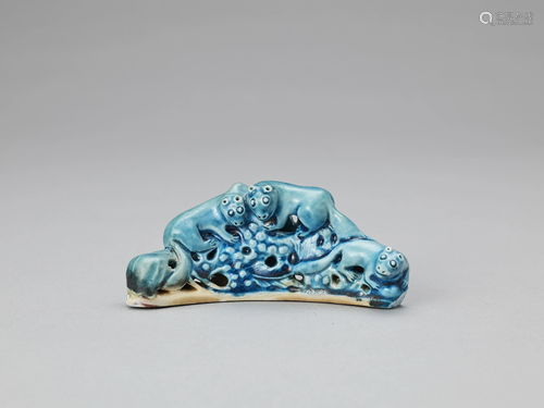 A PORCELAIN BRUSH REST, KANGXI