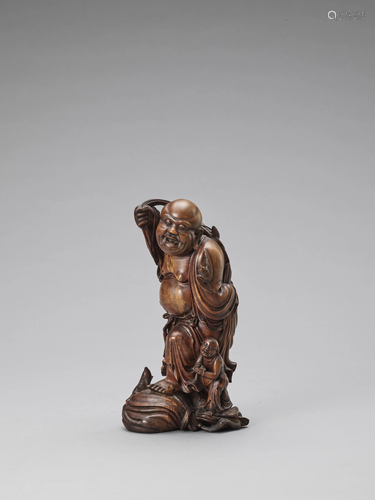 A ROOTWOOD SCULPTURE OF BUDAI, QING