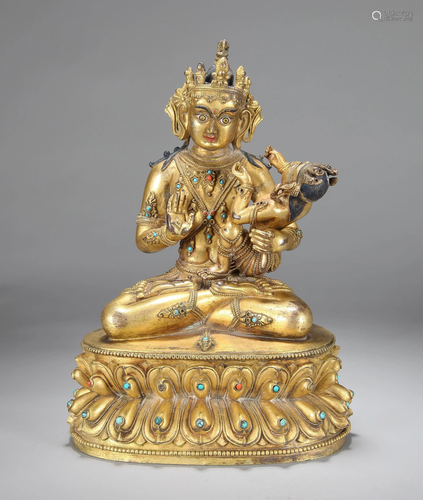 A CHINESE GILT BRONZE FIGURE OF GUANYI…