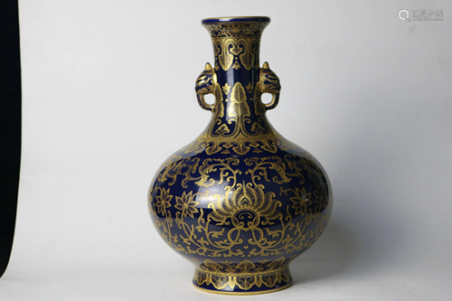 A CHINESE BLUE GLAZED BOTTLE VASE, QING …