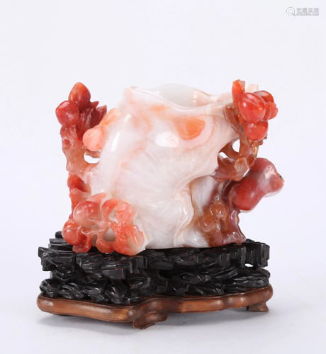 A CHINESE CARVED RED AGATE VASE, QING DYN…