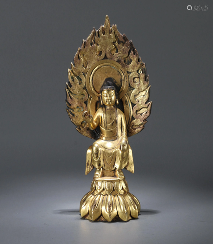 A CHINESE GILT BRONZE FIGURE OF BUDDHA…