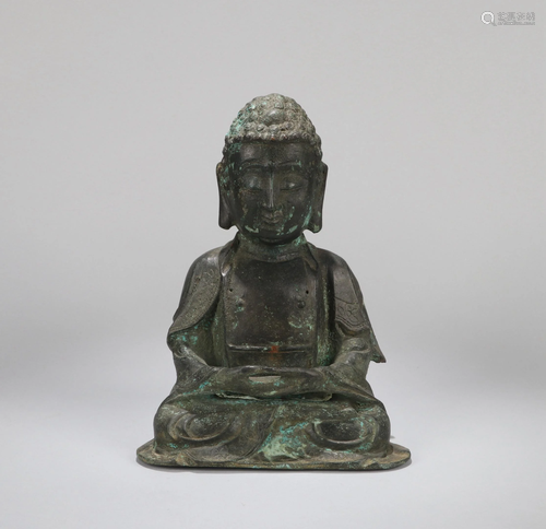 A CHINESE BRONZE FIGURE OF SHAKYAMUNI, MI…