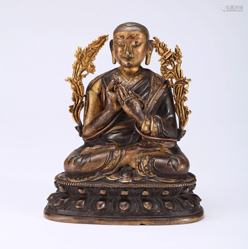 A CHINESE GILT BRONZE FIGURE OF TSONGK…