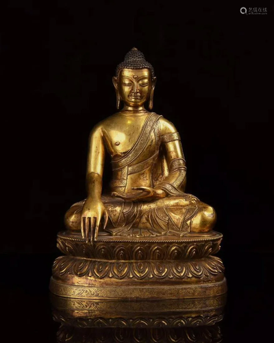 A CHINESE GILT BRONZE FIGURE OF QING D…