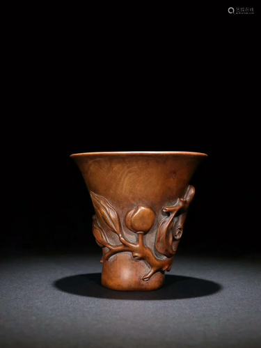 A CHINESE CARVED BOXWOOD PEACH-SHAPED …