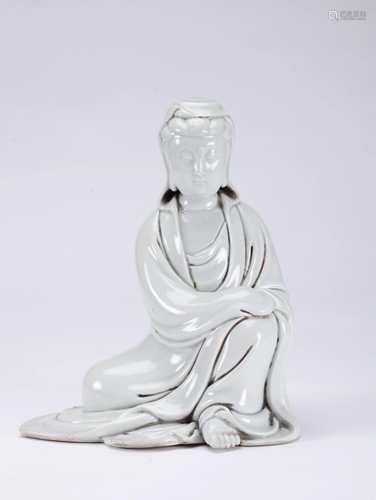 A CHINESE BLANC-DE-CHINE FIGURE OF GUANYIN,…