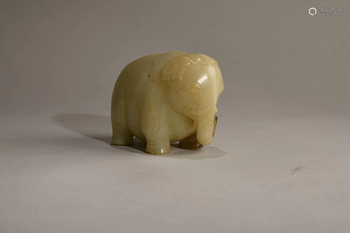 A CHINESE CARVED JADE ELEPHANT, 18TH CENTU…