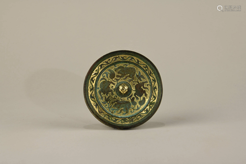 A CHINESE BRONZE MIRROR, 17TH CENTURY