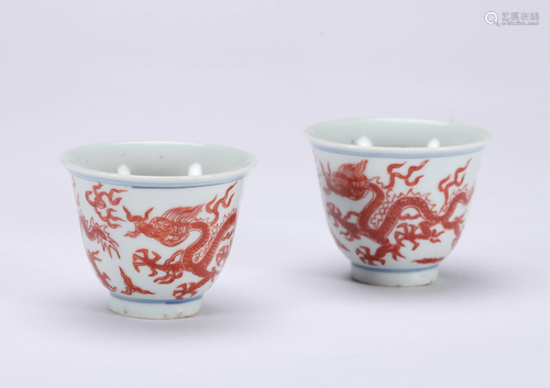 A PAIR OF CHINESE IRON RED DECORATED CUPS,…