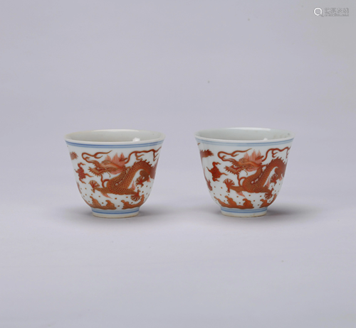 A PAIR OF CHINESE IRON RED DECORATED CUPS,…