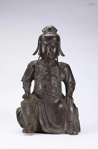 A CHINESE BRONZE FIGURE OF GUANYU, QING …