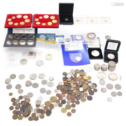 A Collection of Silver and Gold Coins