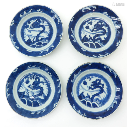 A Series of Four Blue and White Plates