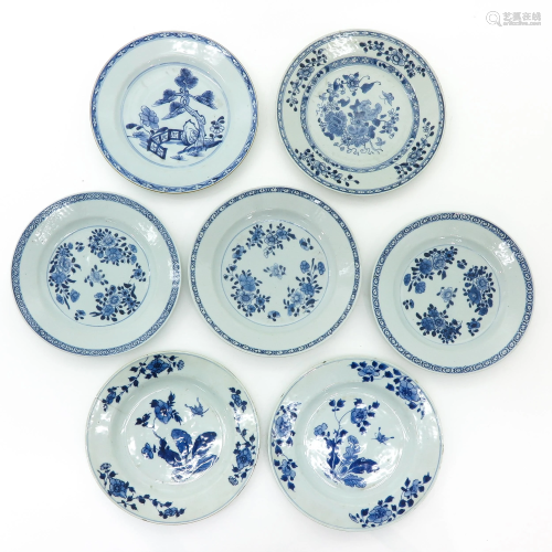 A Collection of Seven Blue and White Plates