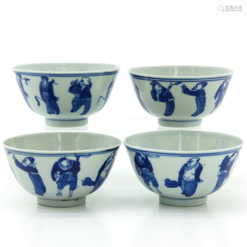 A Series of Four Blue and White Cups