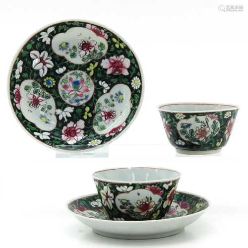 Two Chinese Famille Noir Cups and Saucers