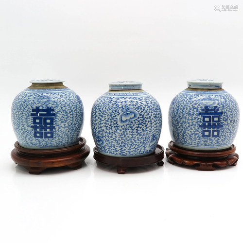 Three Ginger Jars on Carved Wood Base