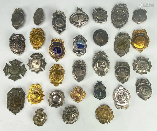 Collection of 31 Antique Fire Department Badges