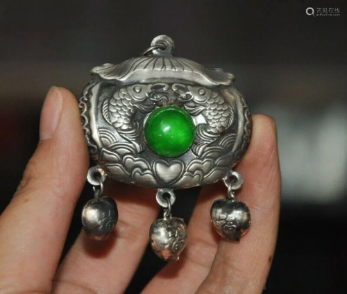 A SILVER INLAY GREEN JADE PENDANT QING DYNA…