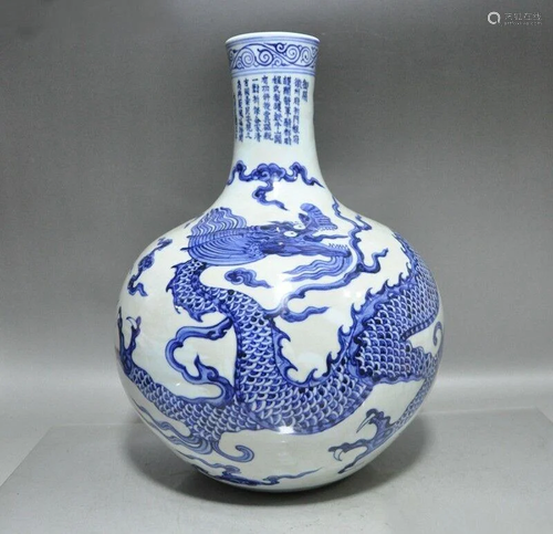 A BLUE AND WHITE DRAGON VASE QING DYNAS…