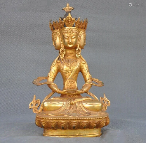 A GILT BRONZE KWANYIN BUDDHA FIGURE …