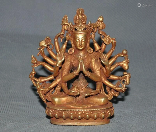 A BRONZE GILT 24KT/GOLD GUANYIN BUDD…