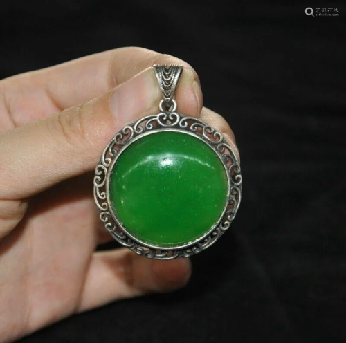 A SILVER INLAY GREEN JADE PENDANT QING DYNA…