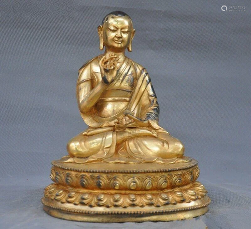 A GILT BRONZE GURU LAMA BUDDHA FIGURE QING…