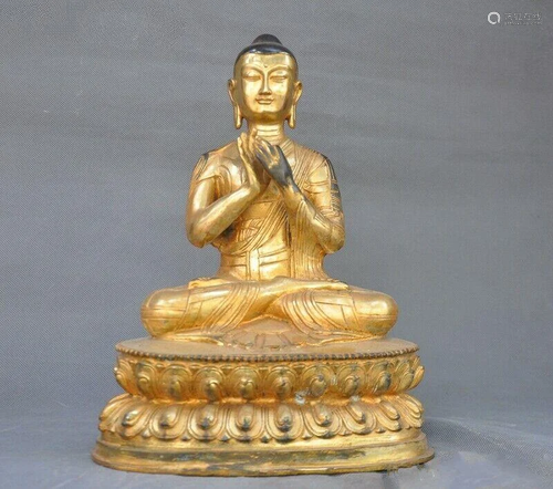 A GILT BRONZE SHAKYAMUNI BUDDHA FIGUR…