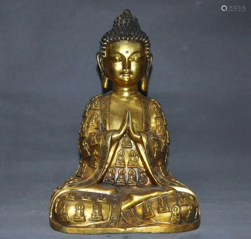 A GILT BRONZE SHAKYAMUNI BUDDHA FIGUR…