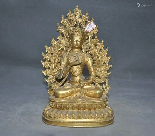 A GILT BRONZE KWANYIN BUDDHA FIGURE …