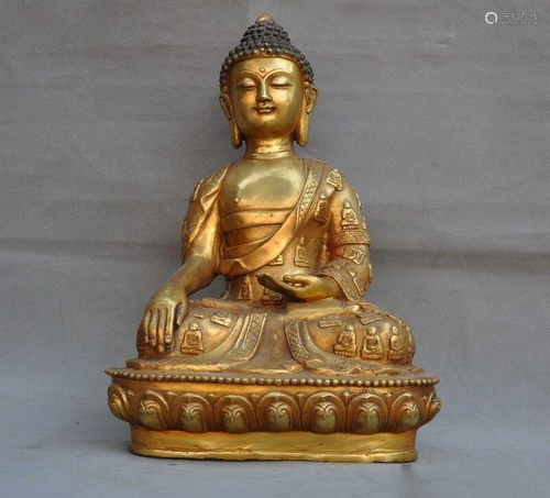 A GILT BRONZE SHAKYAMUNI BUDDHA FIGUR…