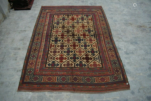 A VINTAGE AFGHANI WOVEN TURKISH RUG.