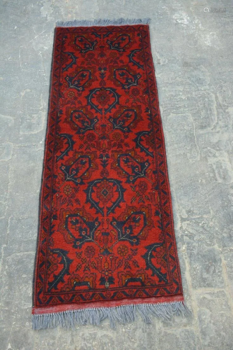 A VINTAGE AFGHANI WOOL TURKOMAN RUG.