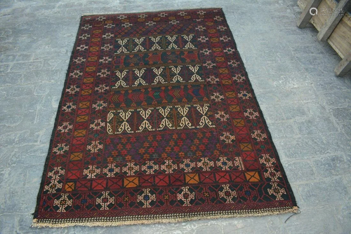 A VINTAGE AFGHANI WOVEN SUMIK RUG.