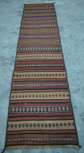 A VINTAGE AFGHANI WOVEN HALLWAY KILIM RUN…