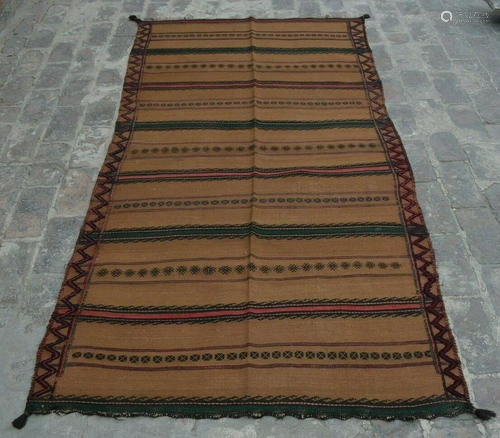 A VINTAGE AFGHANI WOVEN SUMAK KILIM.