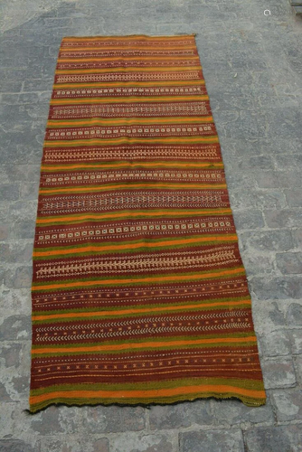 A VINTAGE AFGHANI WOVEN SUMAK KILIM.