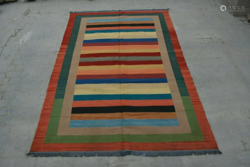 A VINTAGE AFGHANI WOVEN TURKISH KILIM.