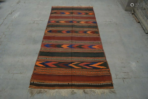 A VINTAGE AFGHANI WOVEN ANATOLIAN KILIM.