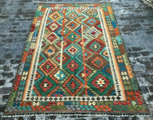 A VINTAGE AFGHANI WOVEN MOROCCAN AREA …