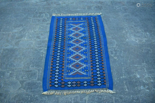 A VINTAGE AFGHANI WOVEN UZBEK KILIM.