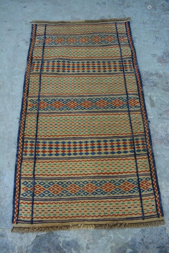 A VINTAGE AFGHANI WOVEN SUMIK KILIM.