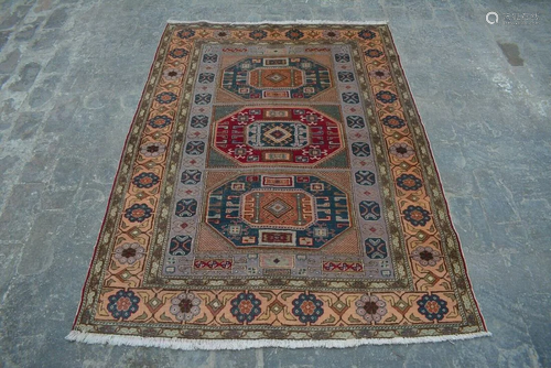 A VINTAGE AFGHANI WOOL ORIENTAL RUG.